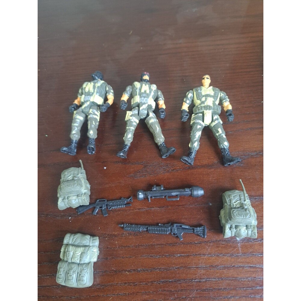 Lot Of 3 Four Inch Action Figures With Accessories